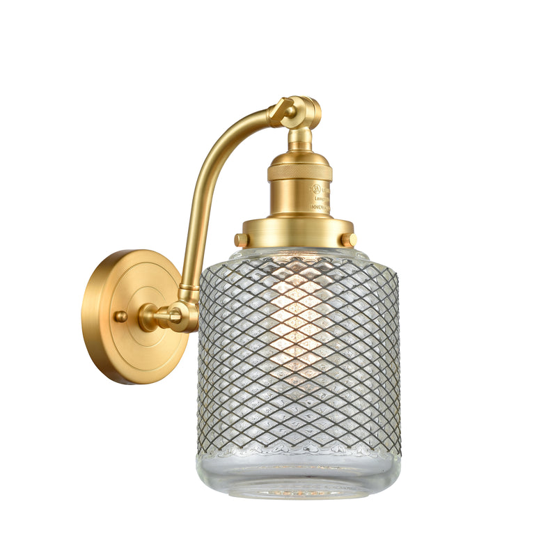 Stanton Sconce shown in the Satin Gold finish with a Clear Wire Mesh shade