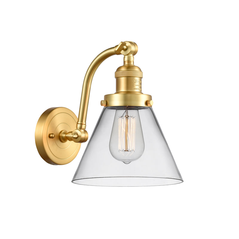 Cone Sconce shown in the Satin Gold finish with a Clear shade