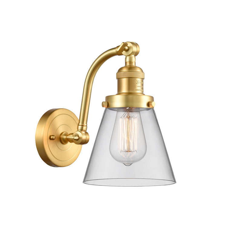 Cone Sconce shown in the Satin Gold finish with a Clear shade