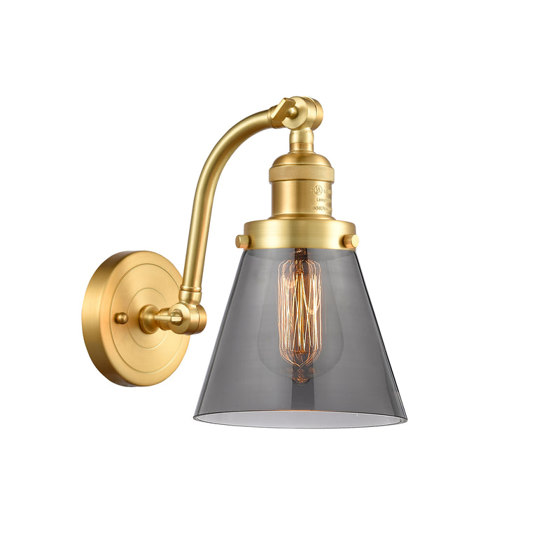 Cone Sconce shown in the Satin Gold finish with a Plated Smoke shade