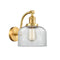 Bell Sconce shown in the Satin Gold finish with a Clear shade