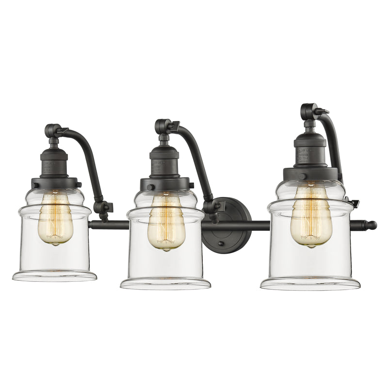 Canton Bath Vanity Light shown in the Oil Rubbed Bronze finish with a Clear shade