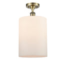 Cobbleskill Semi-Flush Mount shown in the Antique Brass finish with a Matte White shade