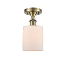 Cobbleskill Semi-Flush Mount shown in the Antique Brass finish with a Matte White shade