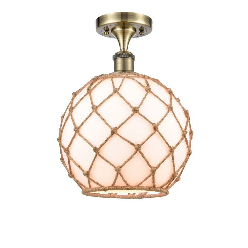 Farmhouse Rope Semi-Flush Mount shown in the Antique Brass finish with a White Glass with Brown Rope shade