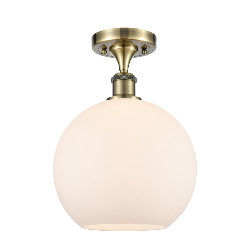 Athens Semi-Flush Mount shown in the Antique Brass finish with a Matte White shade