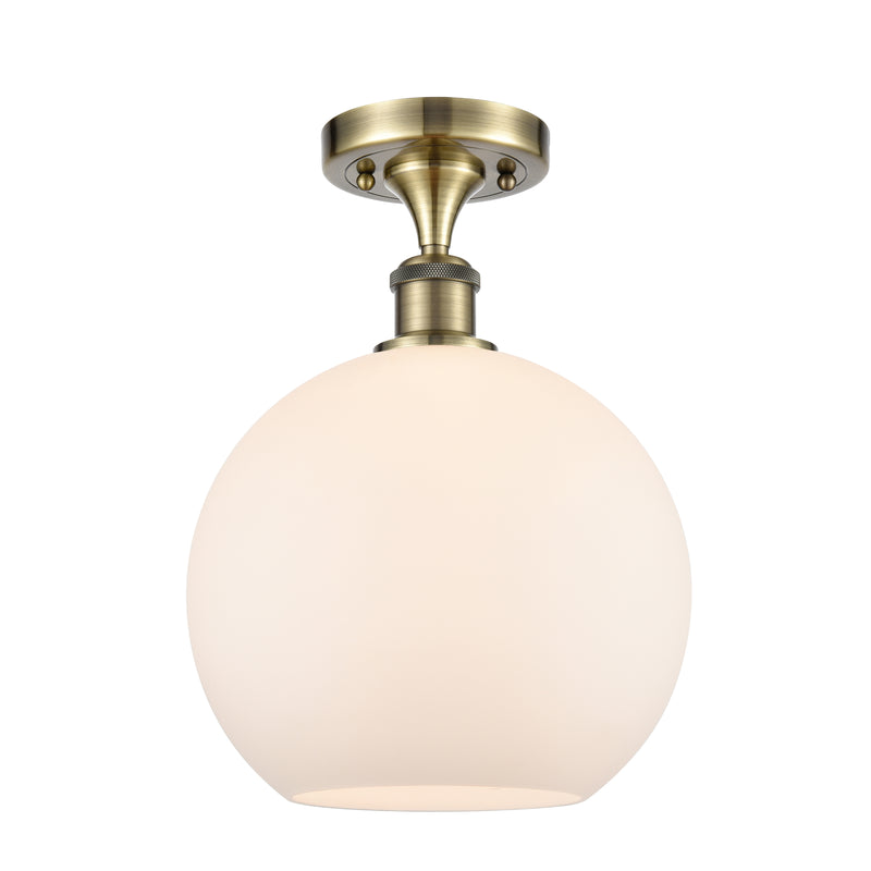 Athens Semi-Flush Mount shown in the Antique Brass finish with a Matte White shade