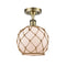 Farmhouse Rope Semi-Flush Mount shown in the Antique Brass finish with a White Glass with Brown Rope shade