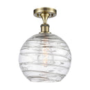 Deco Swirl Semi-Flush Mount shown in the Antique Brass finish with a Clear shade