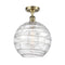 Deco Swirl Semi-Flush Mount shown in the Antique Brass finish with a Clear shade