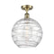 Deco Swirl Semi-Flush Mount shown in the Antique Brass finish with a Clear shade