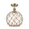 Farmhouse Rope Semi-Flush Mount shown in the Antique Brass finish with a Clear Glass with Brown Rope shade