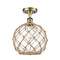 Farmhouse Rope Semi-Flush Mount shown in the Antique Brass finish with a Clear Glass with Brown Rope shade