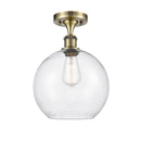 Athens Semi-Flush Mount shown in the Antique Brass finish with a Seedy shade