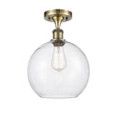 Athens Semi-Flush Mount shown in the Antique Brass finish with a Seedy shade