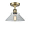 Orwell Semi-Flush Mount shown in the Antique Brass finish with a Clear shade