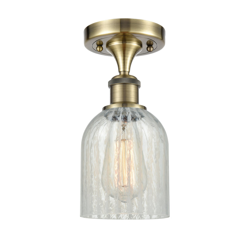 Caledonia Semi-Flush Mount shown in the Antique Brass finish with a Mouchette shade