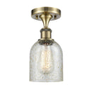 Caledonia Semi-Flush Mount shown in the Antique Brass finish with a Mica shade