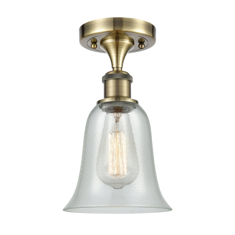 Hanover Semi-Flush Mount shown in the Antique Brass finish with a Fishnet shade