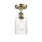 Hadley Semi-Flush Mount shown in the Antique Brass finish with a Clear shade