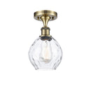 Waverly Semi-Flush Mount shown in the Antique Brass finish with a Clear shade