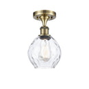 Waverly Semi-Flush Mount shown in the Antique Brass finish with a Clear shade