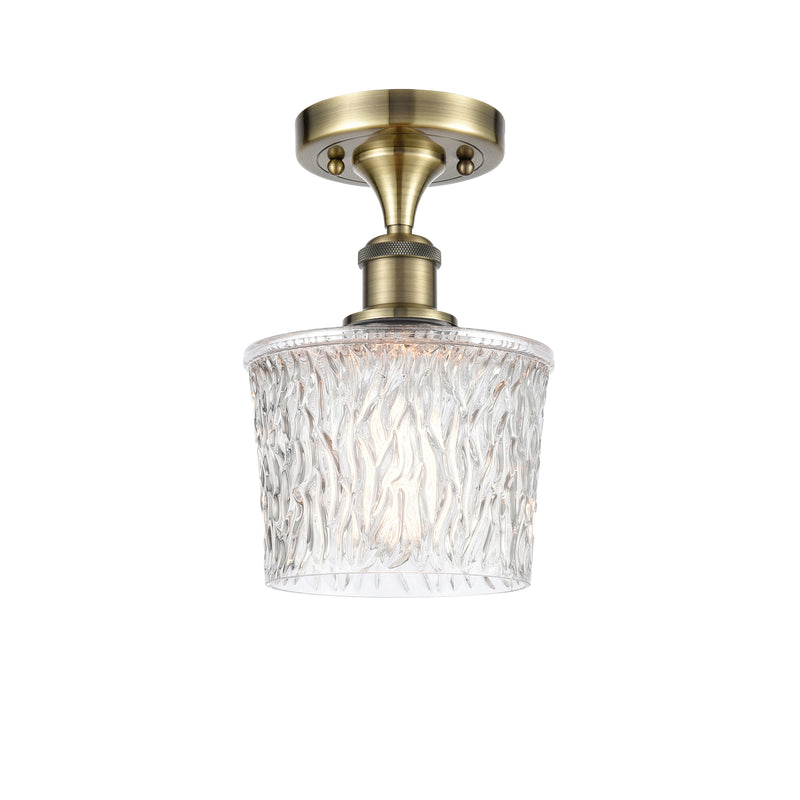 Niagra Semi-Flush Mount shown in the Antique Brass finish with a Clear shade