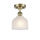 Dayton Semi-Flush Mount shown in the Antique Brass finish with a White shade