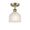 Dayton Semi-Flush Mount shown in the Antique Brass finish with a White shade