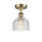 Dayton Semi-Flush Mount shown in the Antique Brass finish with a Clear shade