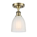 Brookfield Semi-Flush Mount shown in the Antique Brass finish with a White shade