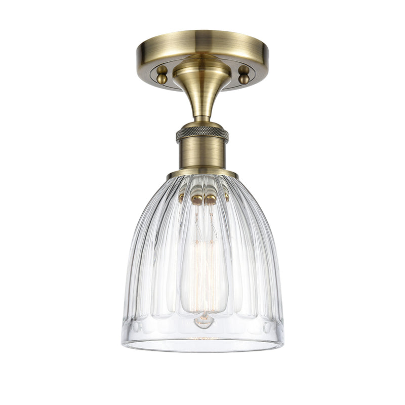 Brookfield Semi-Flush Mount shown in the Antique Brass finish with a Clear shade