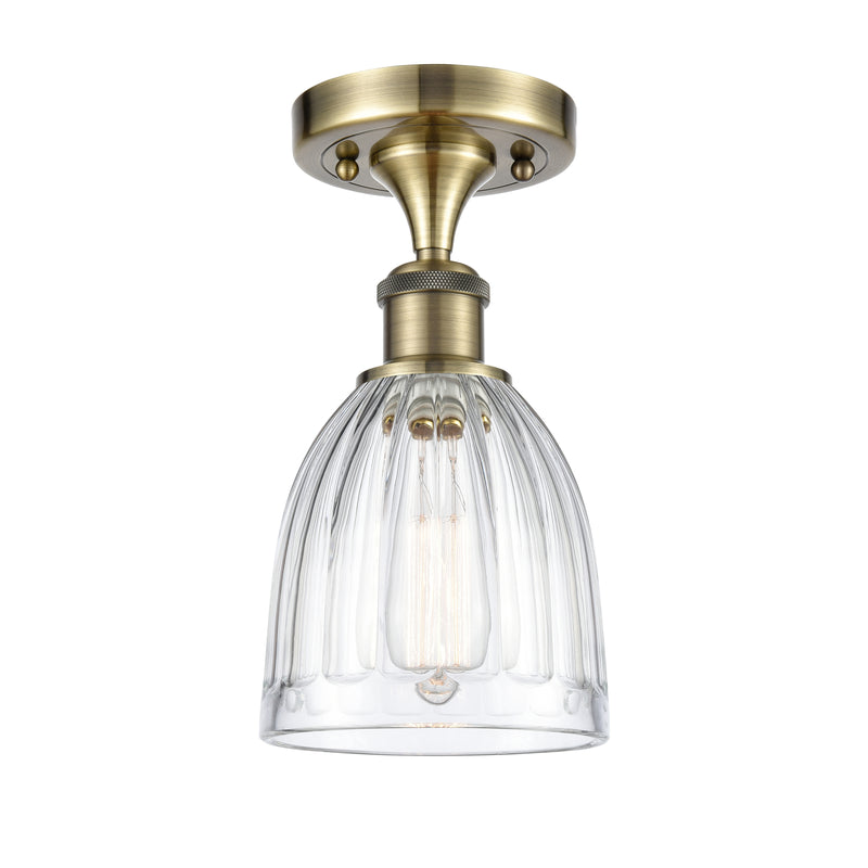 Brookfield Semi-Flush Mount shown in the Antique Brass finish with a Clear shade