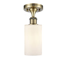 Clymer Semi-Flush Mount shown in the Antique Brass finish with a Matte White shade