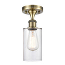 Clymer Semi-Flush Mount shown in the Antique Brass finish with a Clear shade