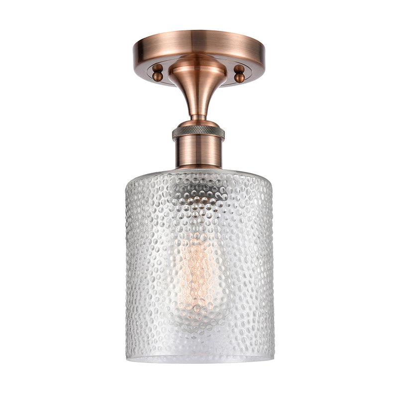 Cobbleskill Semi-Flush Mount shown in the Antique Copper finish with a Clear shade