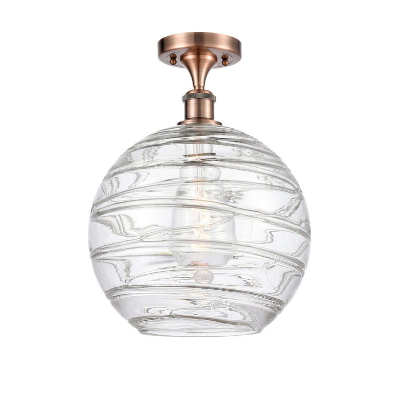 Deco Swirl Semi-Flush Mount shown in the Antique Copper finish with a Clear shade