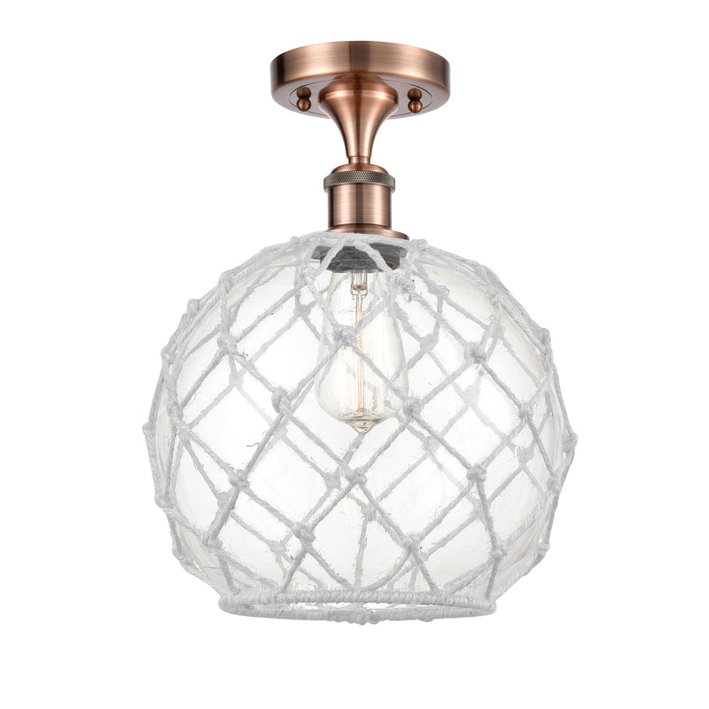 Farmhouse Rope Semi-Flush Mount shown in the Antique Copper finish with a Clear Glass with White Rope shade