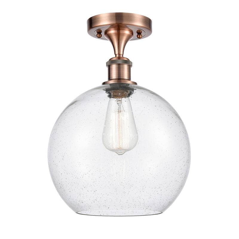 Athens Semi-Flush Mount shown in the Antique Copper finish with a Seedy shade