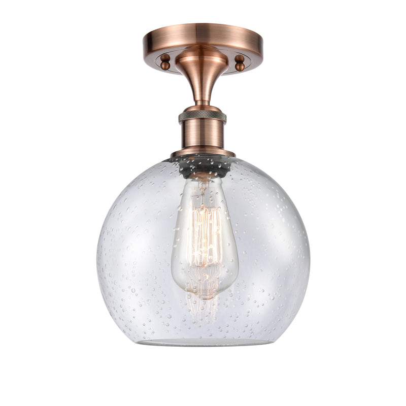 Athens Semi-Flush Mount shown in the Antique Copper finish with a Seedy shade