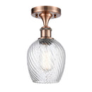 Salina Semi-Flush Mount shown in the Antique Copper finish with a Clear Spiral Fluted shade