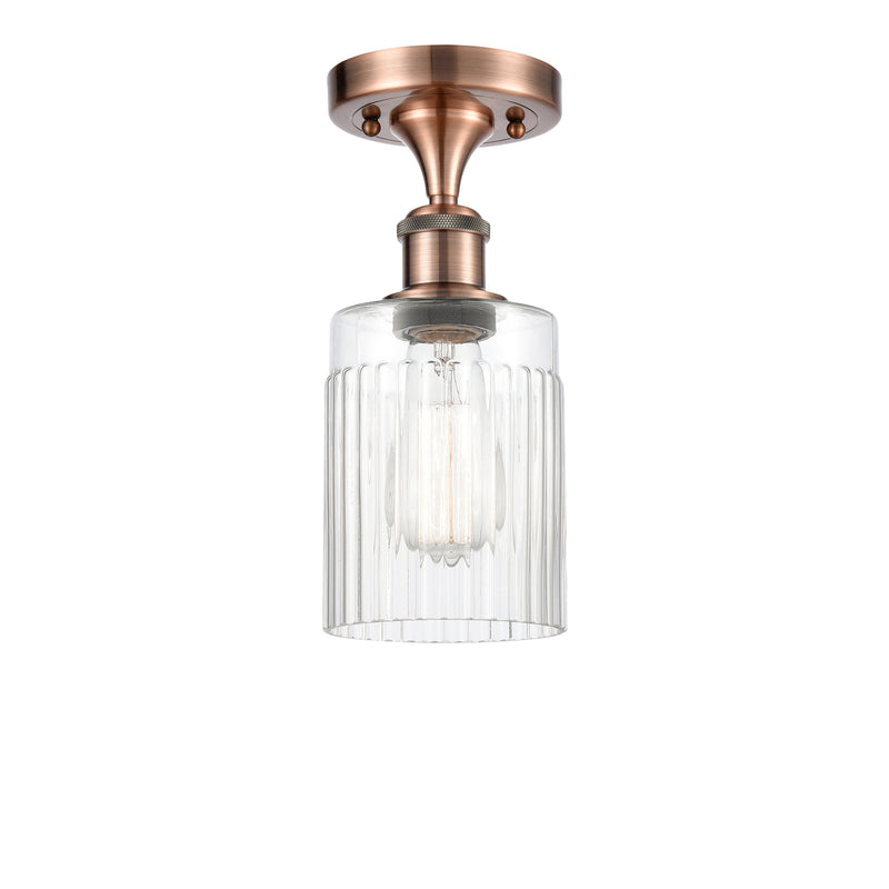 Hadley Semi-Flush Mount shown in the Antique Copper finish with a Clear shade