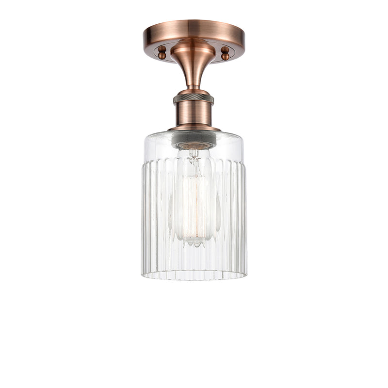 Hadley Semi-Flush Mount shown in the Antique Copper finish with a Clear shade