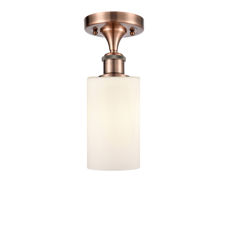 Clymer Semi-Flush Mount shown in the Antique Copper finish with a Matte White shade