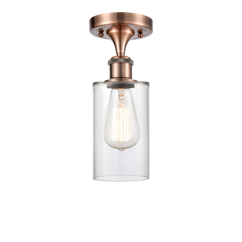 Clymer Semi-Flush Mount shown in the Antique Copper finish with a Clear shade