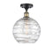 Deco Swirl Semi-Flush Mount shown in the Black Antique Brass finish with a Clear shade