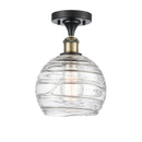 Deco Swirl Semi-Flush Mount shown in the Black Antique Brass finish with a Clear shade