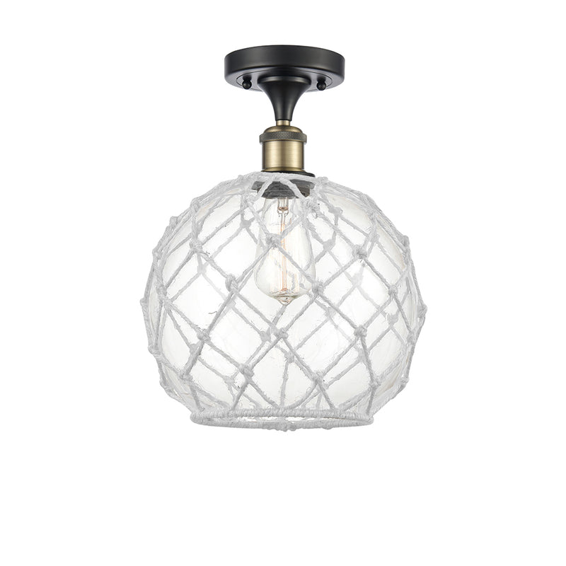 Farmhouse Rope Semi-Flush Mount shown in the Black Antique Brass finish with a Clear Glass with White Rope shade