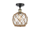 Farmhouse Rope Semi-Flush Mount shown in the Black Antique Brass finish with a Clear Glass with Brown Rope shade