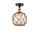 Farmhouse Rope Semi-Flush Mount shown in the Black Antique Brass finish with a Clear Glass with Brown Rope shade